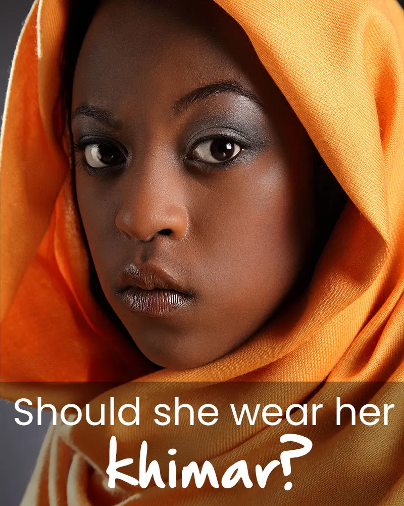 a woman wearing a khimar/ head scarf