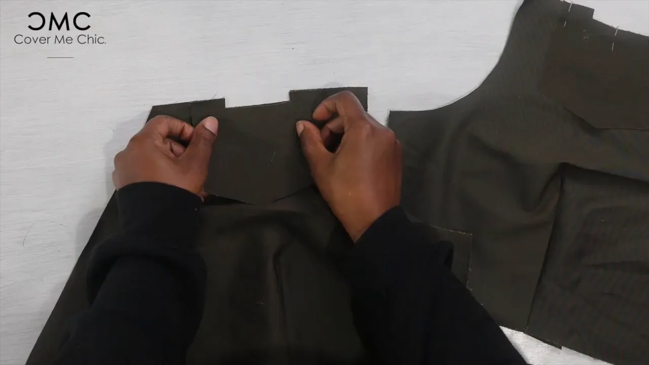 Attaching pocket facing to the front bodice of the dress