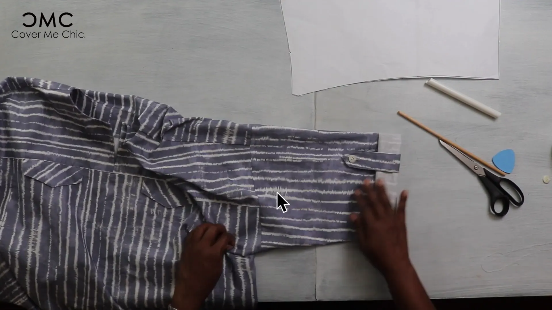 Sewing buttons on sleeve tabs and finishing hems